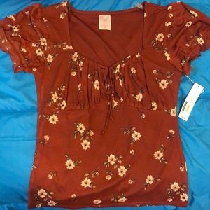 1 cute reddish flower shirt